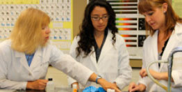 Photo of students in a lab